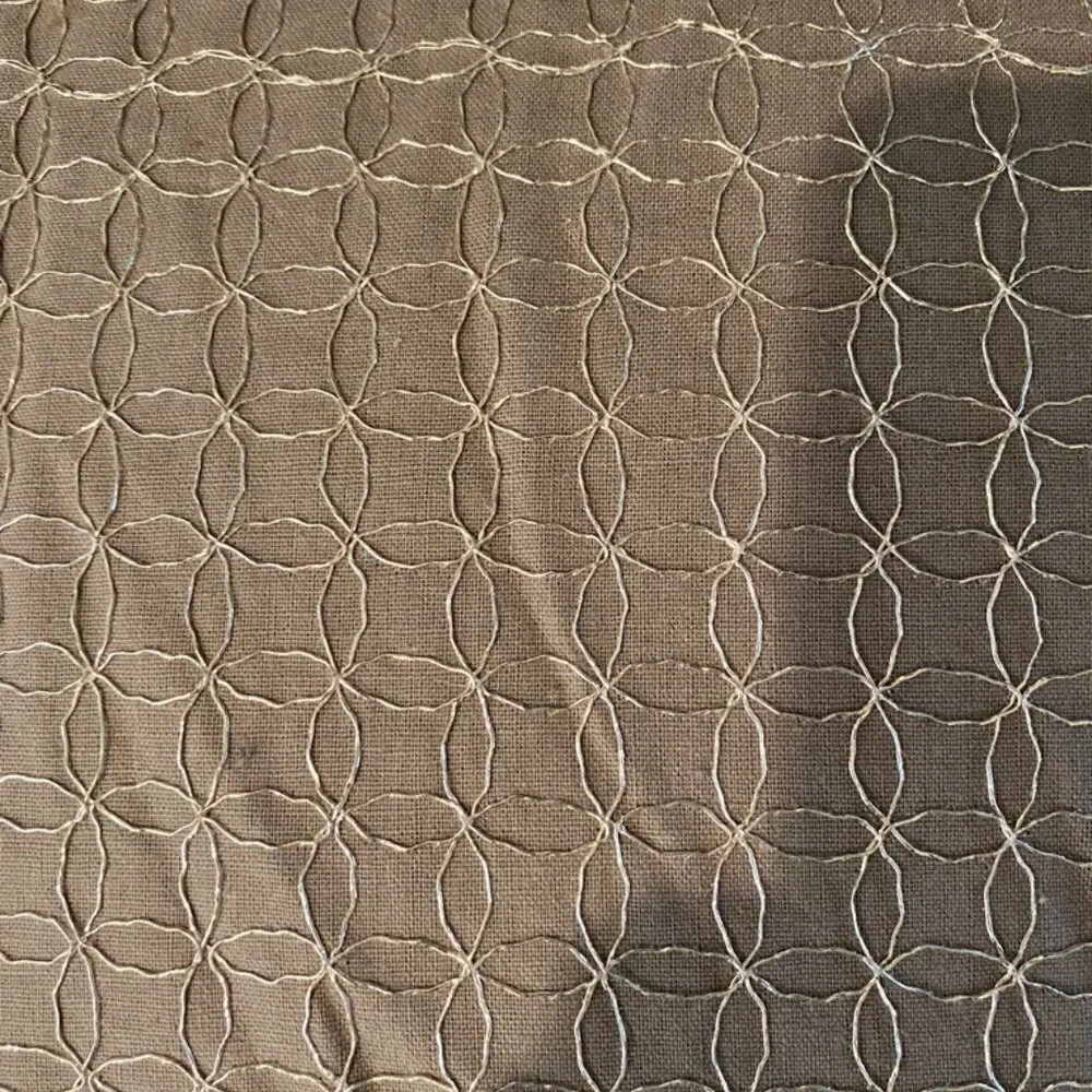 Calvin Klein silver embroidered grey pillow